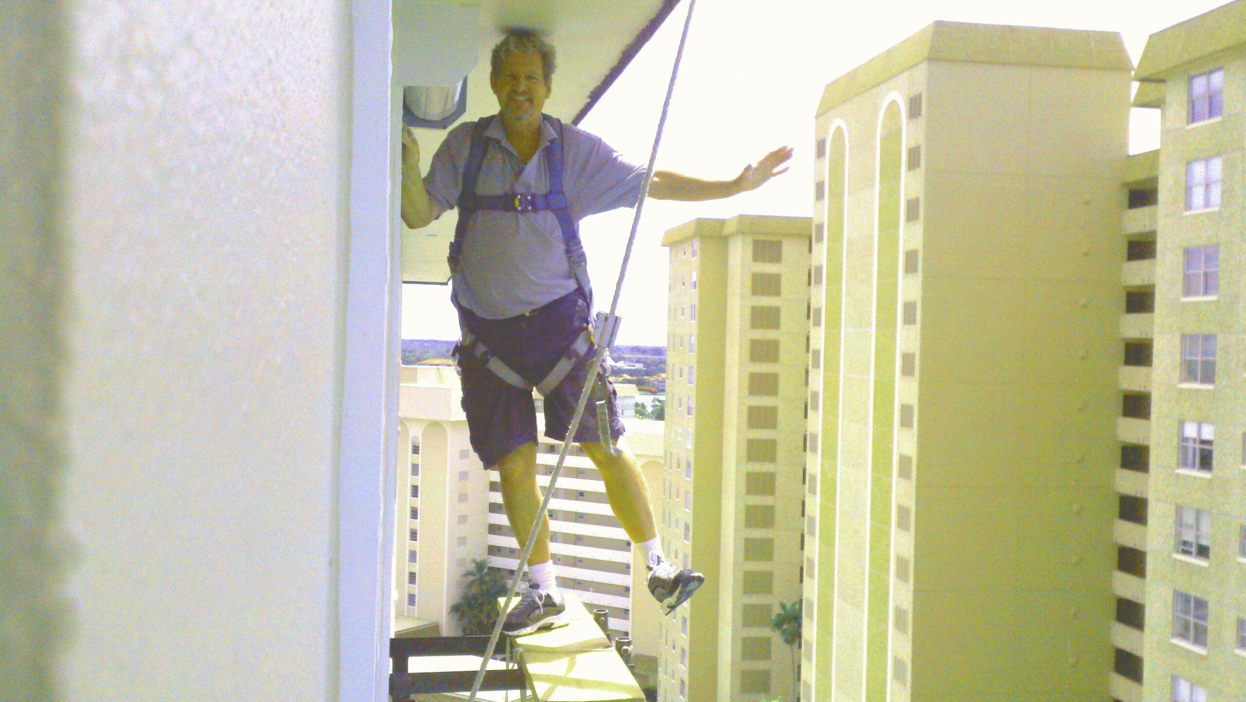 repairing hurricane shutter on high rise